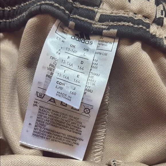 Adidas Camo Pants with Neon Orange accents. Boys size large - Picture 2 of 7